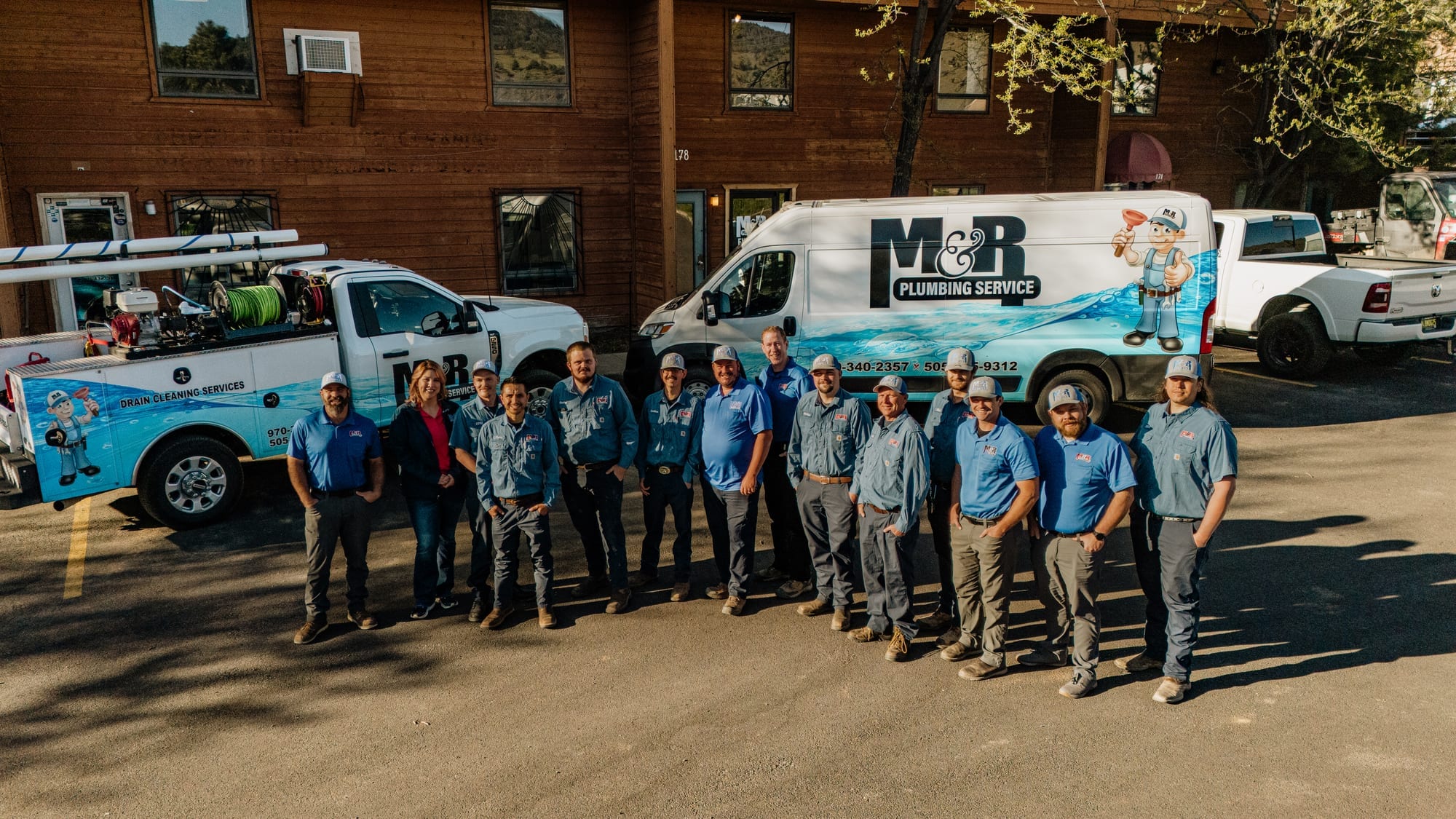 The M&R Service crew outside the shop